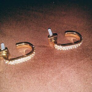 Gold tone & multi rows of tiny rhinestone pushback earrings .
